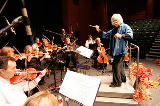 Conductor Rodolfo Fernandez, founder and leader of the Nevada Chamber Symphony, rehearses with his group at the Clark County Library Theater Sunday, October 4, 2009. 
