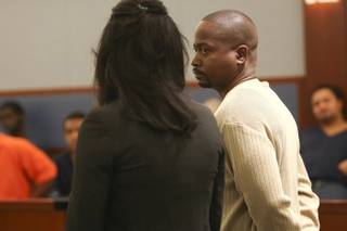 Willie Culver watches public defender Cesely Hopper while speaking on his behalf to District Court Judge Elissa F. Cadish during his sentencing hearing Monday at the Regional Justice Center.  