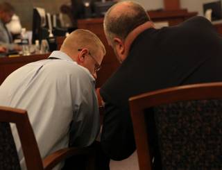 John Morgan talks with his attorney, Marty Hart, during jury selection Tuesday.  Morgan and another man, Roger Jenkins, are accused of setting a pipe bomb off inside the Burlington Coat Factory store in Henderson earlier this year.