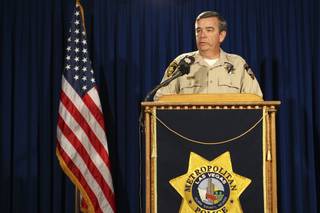 Sheriff Douglas Gillespie addresses the media Thursday at Metro Police headquarters on a single-vehicle crash that resulted in the death of Officer Milburn 