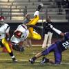 Photo: Dragons running back Dezerick Reed (7) goes airbor Photo: Dragons running back Dezerick Reed (7) goes airbor