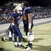Photo: Legacy's Dom Fuiava, right, hugs teammates DeShae Photo: Legacy's Dom Fuiava, right, hugs teammates DeShae