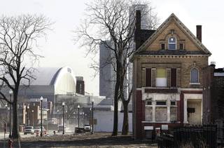 Vacant properties such as this house north of downtown Detroit are prevalent in a city that has lost about half its population since its peak in 1950. The steady decline of the U.S. auto industry is largely to blame for the exodus. 