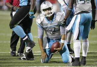 Las Vegas Locomotives quarterback J.P. Losman is slow to get up after being sacked during their game against the Florida Tuskers on Wednesday at Sam Boyd Stadium. Florida won the game 29-15.