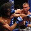 Ben Henderson, left, takes a shot from Donald Cerrone during their WEC interim lightweight championship bout Saturday Oct. 10, 2009 in San Antonio. Henderson defeated Cerrone by unanimous decision but suffered a severe eye injury in the process.