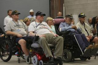 Resident of the Nevada State Veterans Home in Boulder City attend the dedication ceremony of the 5,400-square-foot new maintenance facility Thursday at the Veterans Memorial Cemetery in Boulder City.