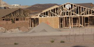 A partially constructed home in Tuscany is one of hundreds of homes in the development that are expected to be built or completed by a new developer. Creditors for Tuscany's original developer, Jim Rhodes, are expected to take control of the development next year and sell it to another home building company to complete.