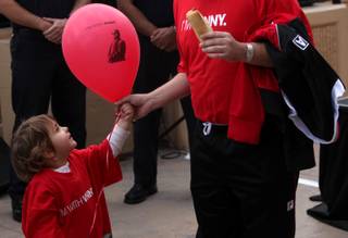Bella King-Raniola looks up at her dad red Vinny, Jon Paul Raniola Tuesday during the event at New York New York to find the Hotel and Casinos official spokesman.