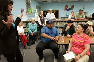 Louise Helton, the state director of Communities in Schools, speaks to neighbors of the school during a community meeting at Elaine Wynn Elementary School about a proposed health clinic on the school's campus in Las Vegas Monday, Nov. 2, 2009. 