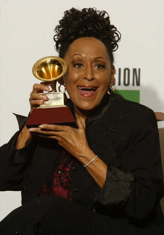 Omara Portuondo poses with the award for Best Contemporary Tropical Album at the 10th annual Latin Grammy Awards at the Mandalay Bay Events Center.