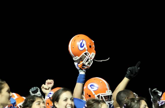 The Bishop Gorman Gaels celebrate a 56-14 victory against the Cheyenne Desert Shields Friday in the Sunset Regional quarterfinals.