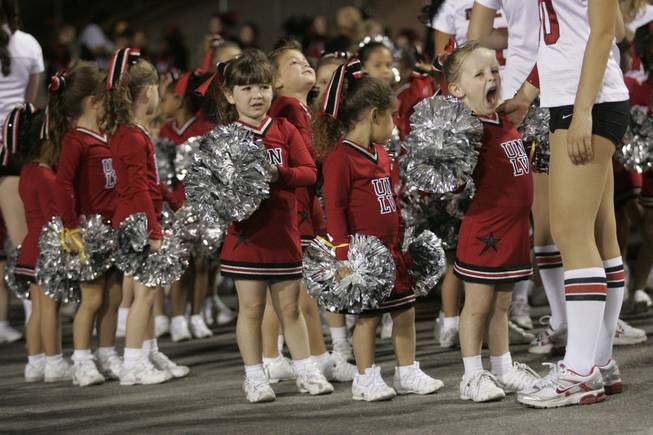 UNLV Rebel Starzz member Abby Costolo yawns before performing at half time of UNLV's game against Colorado State Saturday at Sam Boyd Stadium.