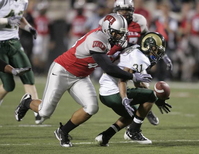 UNLV Kamu Kapanui covers Colorado State wide receiver Dion Morton on a fumbled punt reception during the second half of their game Saturday, November 7, 2009 at Sam Boyd Stadium.  Morton recovered the ball as UNLV went on to win the game 35-16.