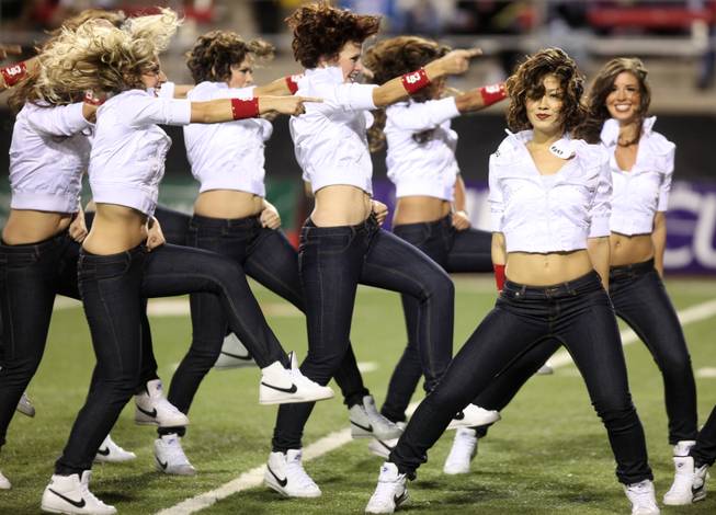 The Rebel Girls performs during a time out during the UNLV game against Colorado St. at Sam Boyd Stadium Saturday.  UNLV came out on top 35-16..