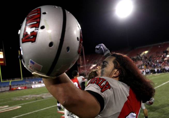 UNLV's Malo Taumua celebrates the Rebels 35-16 win over Colorado St. at Sam Boyd Stadium Saturday.