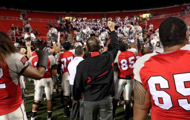 Head coach Mike Sanford and the UNLV team celebrates the Rebels 35-16 win over Colorado State on Nov. 7, 2009, at Sam Boyd Stadium.
