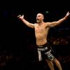 Mike Swick celebrates his second-round TKO win over Ben Saunders at UFC 99 in Lanxess Arena in Germany on June 13, 2009. Mike Swick celebrates his second-round TKO win over Ben Saunders at UFC 99 in Lanxess Arena in Germany on June 13, 2009.