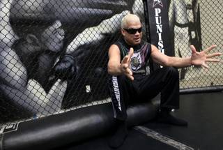 Tito Ortiz talks to the media during open workouts at his training facility in Big Bear, Calif.