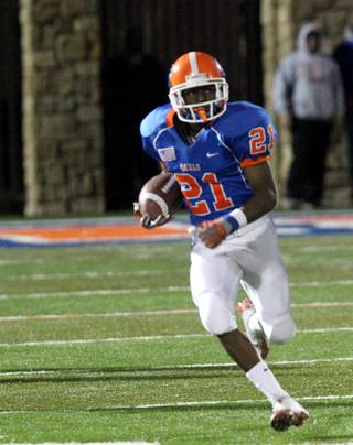 Johnathan Loyd of Bishop Gorman runs a kickoff back for a touchdown Friday during the Sunset Regional semifinals against Palo Verde.  Gorman came out on top 38-28.