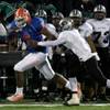 Bishop Gorman's Xavier Grimble looks for yards after the catch during the Sunset Regional semifinals against Palo Verde. Bishop Gorman's Xavier Grimble looks for yards after the catch during the Sunset Regional semifinals against Palo Verde.