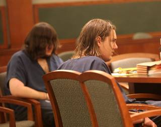 Victor Antonio Veliz, left, sits beside Timothy Chester during a hearing Tuesday in Las Vegas Justice Court. Both are charged in the deaths of Chester's parents. 