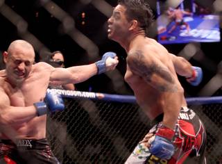 Leonard Garcia swings at Manvel Gamburyan during their Featherweight bout Wednesday at the Palms.  Gamburyan won by unanimous decision.