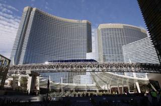 A tram passes in front of Aria during a tour of MGM Mirage's CityCenter project Wednesday, Nov. 18, 2009. Properties in the $8.5 billion project will open next month. 