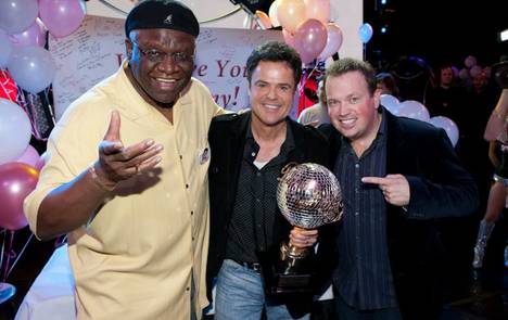 George Wallace, Donny Osmond and Nathan Burton during Donny's return to the Flamingo with his champion's mirrored disco ball trophy on Nov. 25, 2009, after his win on ABC's Dancing With the Stars with Kym Johnson on Tuesday night. George Wallace, Donny Osmond and Nathan Burton during Donny's return to the Flamingo with his champion's mirrored disco ball trophy on Nov. 25, 2009, after his win on ABC's Dancing With the Stars with Kym Johnson on Tuesday night.