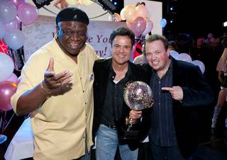 George Wallace, Donny Osmond and Nathan Burton during Donny's return to the Flamingo with his champion's mirrored disco ball trophy on Nov. 25, 2009, after his win on ABC's Dancing With the Stars with Kym Johnson on Tuesday night.