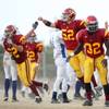 Members of the Del Sol High defense react after they forced Basic quarterback Tyler Dobbins to fumble with less than a minute to play in the Sunrise Regional championship game. Members of the Del Sol High defense react after they forced Basic quarterback Tyler Dobbins to fumble with less than a minute to play in the Sunrise Regional championship game.