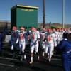 Xavier Grimble, No. 6, leads Bishop Gorman on to the field Saturday in Sparks to take on Reed. Despite not catching a pass, Grimble helped Gorman topple Reed 62-21.