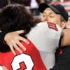 UNLV head coach Mike Sanford embraces Malo Taumua after the team's 24-20 season-ending win against San Diego State on Saturday at Sam Boyd Stadium. UNLV head coach Mike Sanford embraces Malo Taumua after the team's 24-20 season-ending win against San Diego State on Saturday at Sam Boyd Stadium.