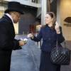 Doorman Reggie Horsford interacts with Anja Luthje, corporate director of rooms, during a training simulation at the Mandarin Oriental.
Doorman Reggie Horsford interacts with Anja Luthje, corporate director of rooms, during a training simulation at the Mandarin Oriental.