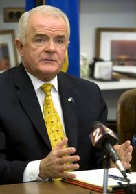 Nevada Gov. Jim Gibbons answers media questions Tuesday, Dec. 8, 2009, at his Capitol office in Carson City.  Gibbons is considering another round of budget cuts and a possible special legislative session to deal with Nevada's fiscal woes. 