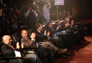 Members of the BYU and Oregon St. football programs meet with the Media Thursday during the Maaco Bowl Las Vegas press conference at the ESPN Zone at New York New York.  The two teams will face off Dec. 22 at Sam Boyd Stadium.