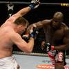 Cheick Kongo (right) delivers a straight right hand to Antoni Hardonk during their heavyweight fight on April 18, 200 in this file photo.