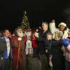 Henderson Mayor Andy Hafen (right of center) celebrates with Santa Claus and guests after lighting the Christmas tree Friday night at the 2009 WinterFest celebration at the Henderson Events Plaza. Henderson Mayor Andy Hafen (right of center) celebrates with Santa Claus and guests after lighting the Christmas tree Friday night at the 2009 WinterFest celebration at the Henderson Events Plaza.