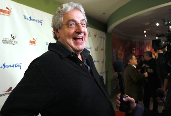 In this Dec. 12, 2009 file photo, actor and director Harold Ramis laughs as he walks the Red Carpet to celebrate The Second City's 50th anniversary in Chicago. An attorney for Ramis said the actor died Monday morning, Feb. 24, 2014, from complications of autoimmune inflammatory disease. He was 69. Ramis is best known for his roles in the comedies "Ghostbusters" and "Stripes."