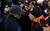BYU head coach Bronco Mendenhall and Oregon St. head coach Mike Riley shake hands after the Cougars won 44-20 in the MAACO Bowl Las Vegas Tuesday at Sam Boyd Stadium.