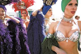 THREE, TWO ... Showgirls, from left, Johanna V., Kari Richards, Jennifer Speelman and J.P. Howard before the NASCAR race in Las Vegas in March. 