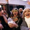 Diana Martinez, at left, Stacy McCain and Natalie Sanchez, from Orange County, Calif., rock out to the tribute band Fan Halen during New Year's 2010 TributePalooza at the Fremont Street Experience in downtown Las Vegas Thursday, Dec. 31, 2009.