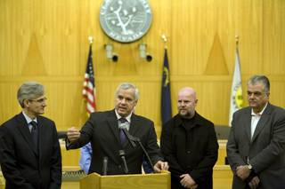 County Commission chairman Rory Reid, from left, Nevada System of Higher Education Chancellor, Dan Klaich, board of regents chairman James Dean Leavitt and commissioner Steve Sisolak announce plans to transform UMC Hospital into public-private teaching hospital, during a press conference at the Government Center in Las Vegas on Wednesday, Jan. 13.