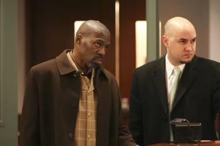 Boxing trainer Roger Mayweather and his attorney, Jack Buchanan, appear before Clark County District Court Hearing Master Kevin Williams during Mayweather's arraignment hearing Thursday at the Regional Justice Center. Mayweather was arraigned on charges connected to the alleged beating of a female boxer in August 2009 in her Las Vegas apartment.