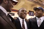 Football players Xavier Grimble, from left, who is headed to USC, Alex Turner, who is headed to Stanford, and Geoffrey Gibson, who is headed to Cal Berkley, pose for photos during National Signing Day at Bishop Gorman High School in Las Vegas Wednesday, February 3, 2010.