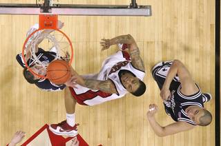 UNLV guard Tre'Von Willis watches his layup go in against BYU Saturday, Feb. 6, 2010, at the Thomas & Mack Center. UNLV upset 12th-ranked BYU 88-74.