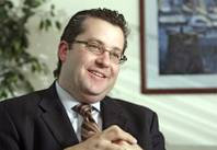 Brian Gordon, principal of Applied Analysis, is shown at the firm's offices.