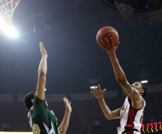 UNLV's Tre'Von Willis attempts a layup Saturday during the Rebels 70-39 victory against Colorado State at the Thomas & Mack Center.