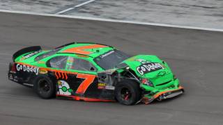 Danica Patrick pulls into the pits after crashing during the NASCAR Nationwide Series Sam's Town 300 auto race at the Las Vegas Motor Speedway on Saturday, Feb. 27, 2010.