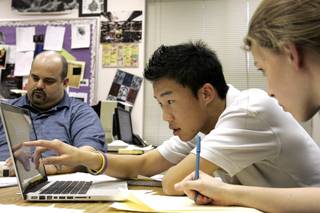 Freshman Austin Lee, center, and sophomore Maddy Walsh formulate an argument during debate class at the Meadows School in Summerlin Thursday, March 4, 2010.