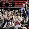 San Diego State coach Steve Fisher salutes fans with the net after their Mountain West Conference championship game against UNLV Saturday, March 13, 2010. San Diego State won the game 55-45. San Diego State coach Steve Fisher salutes fans with the net after their Mountain West Conference championship game against UNLV Saturday, March 13, 2010. San Diego State won the game 55-45.